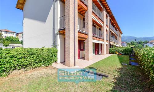BILOCALE CON GIARDINO PRIVATO, PORTICATO E BOX